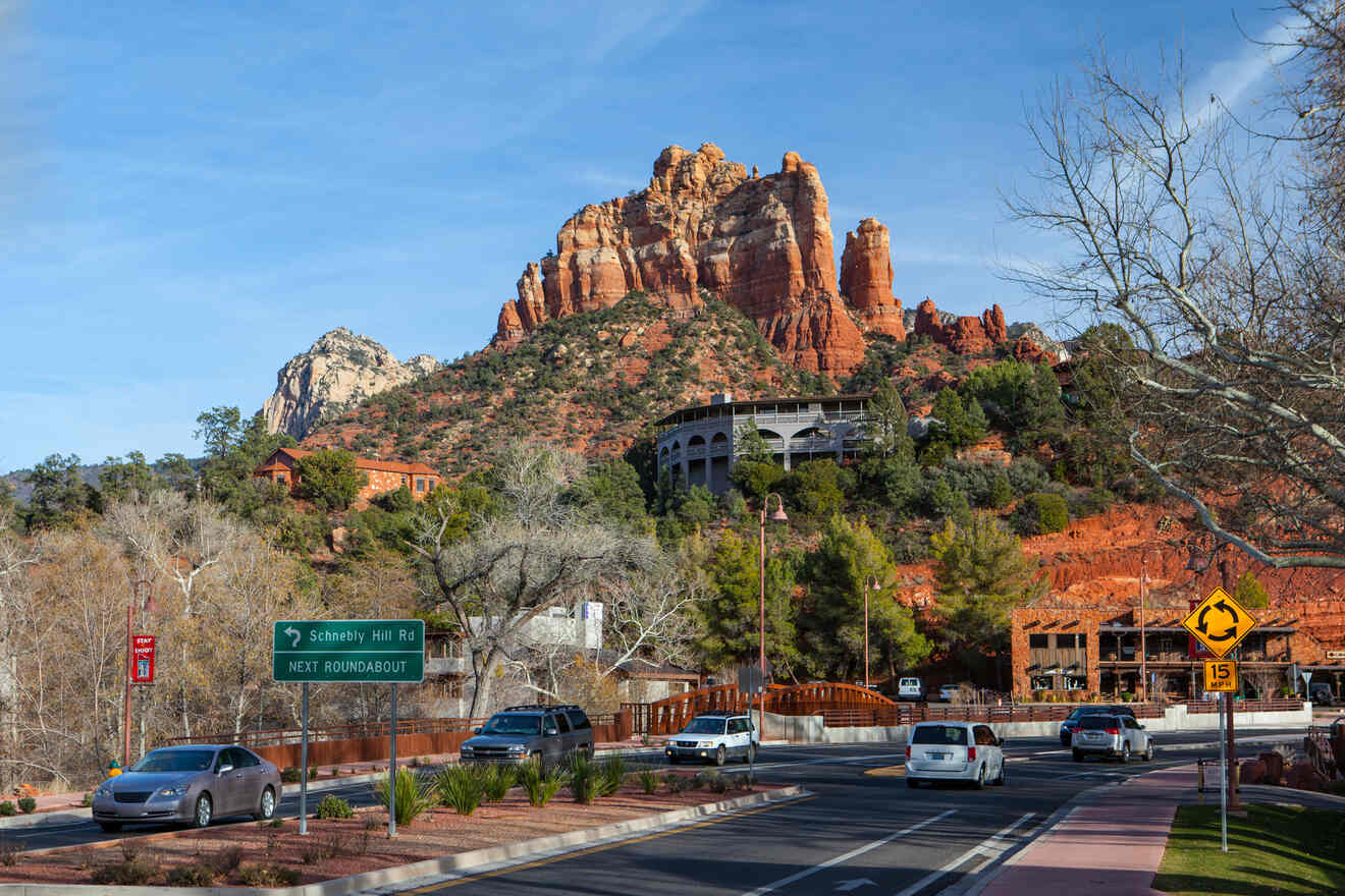 A street in Sedona with rocks in the background